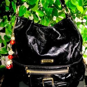 Black patent leather Michael Kors purse w/handmade purse charm